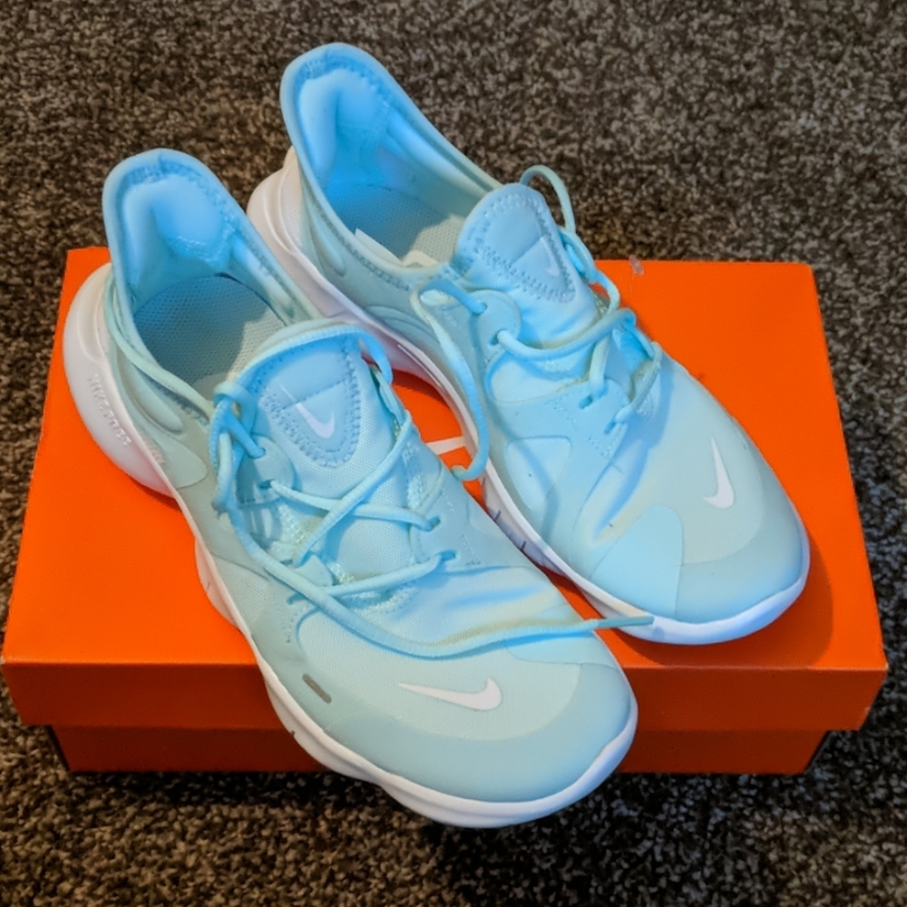 Tiffany blue Nike free sneakers